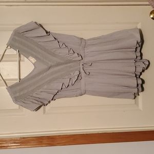 Allie Rose size medium romper. Never worn. Light sage green in color.